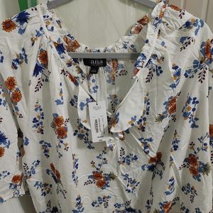 a. n. a. Flowery blouse